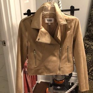 This is a pale moto jacket from Steve Madden